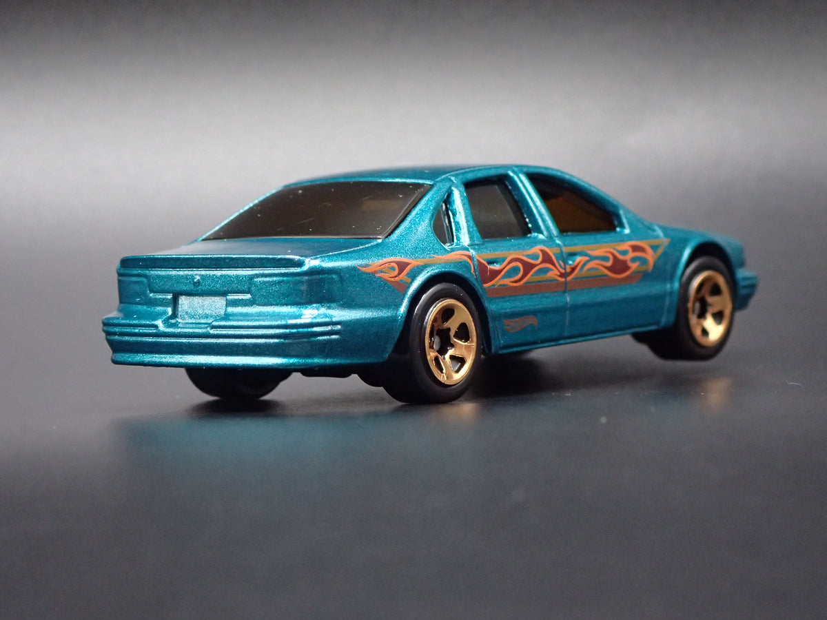 1994 - 1996 CHEVY CHEVROLET IMPALA SS GREEN 1:64 SCALE DIECAST MODEL CAR