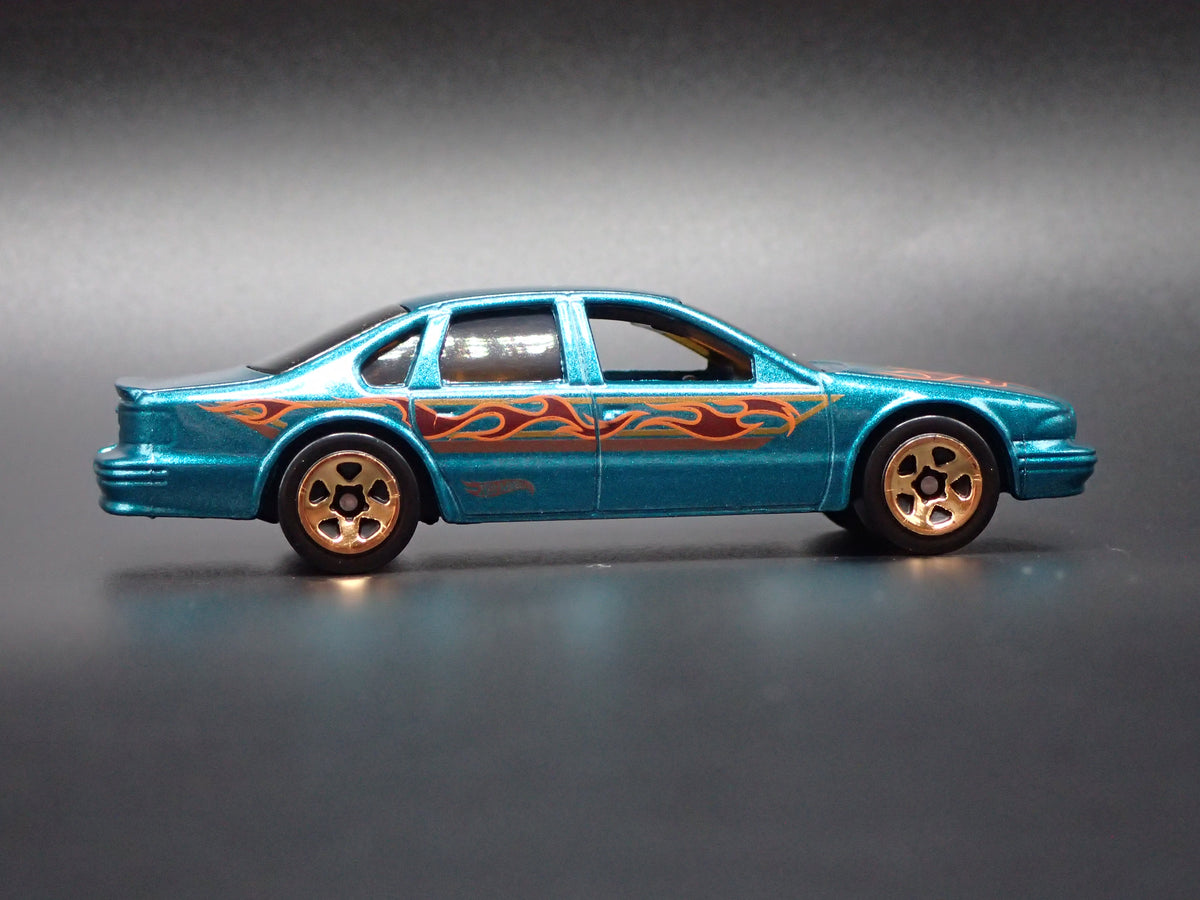 1994 - 1996 CHEVY CHEVROLET IMPALA SS GREEN 1:64 SCALE DIECAST MODEL CAR