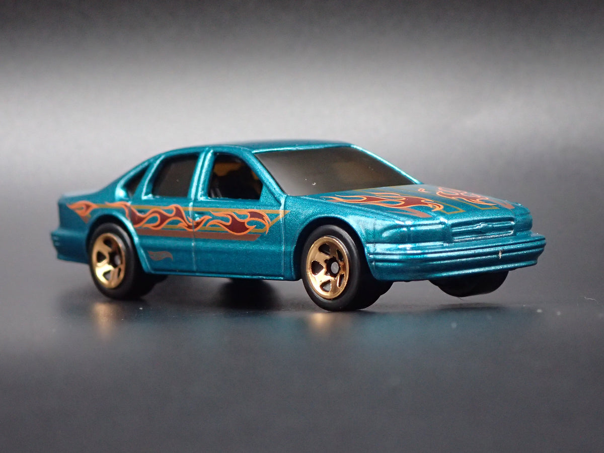 1994 - 1996 CHEVY CHEVROLET IMPALA SS GREEN 1:64 SCALE DIECAST MODEL CAR
