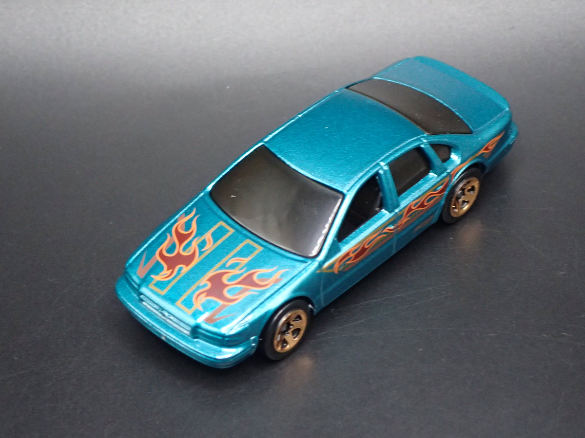 1994 - 1996 CHEVY CHEVROLET IMPALA SS GREEN 1:64 SCALE DIECAST MODEL CAR