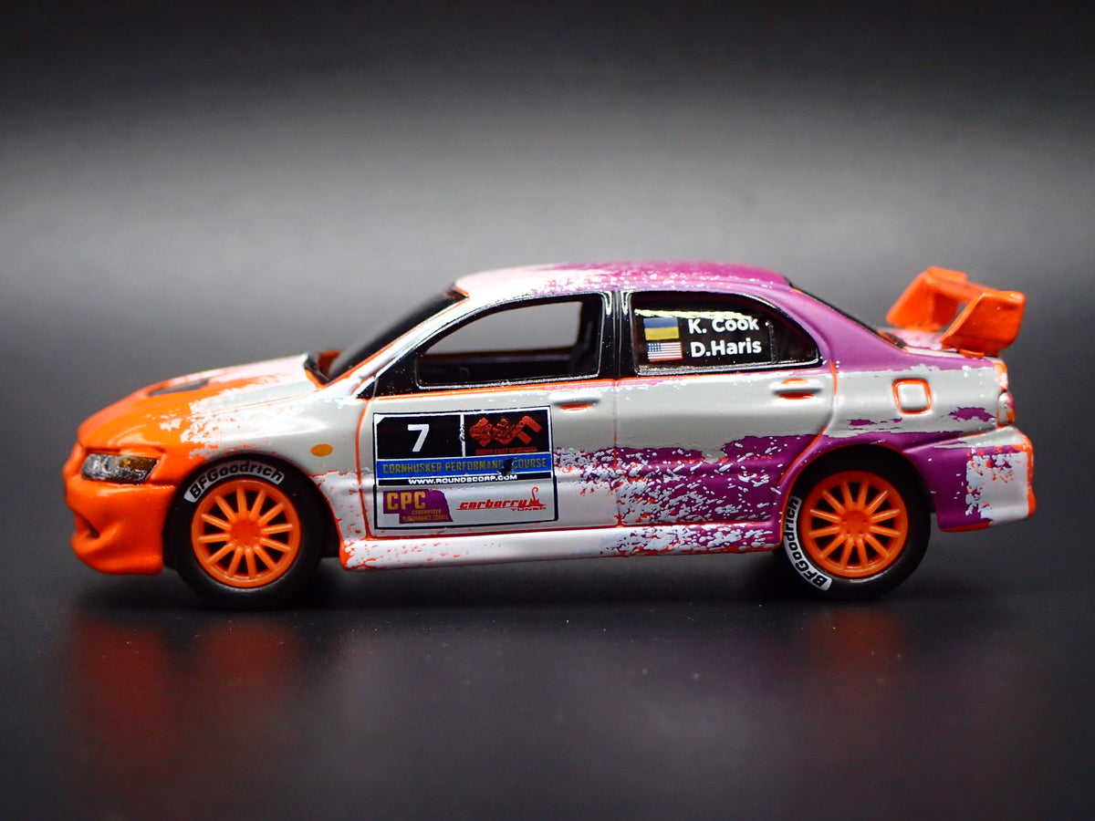 2003-2005 MITSUBISHI LANCER EVOLUTION VIII RALLY ORANGE 1:64 SCALE DIECAST MODEL CAR
