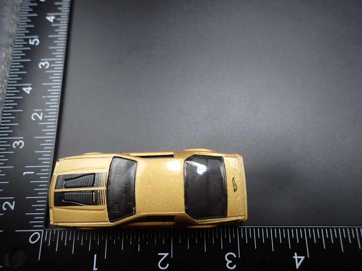 1985 85 CHEVY CHEVROLET CAMARO IROC-Z GOLD 1:64 SCALE DIECAST MODEL CAR