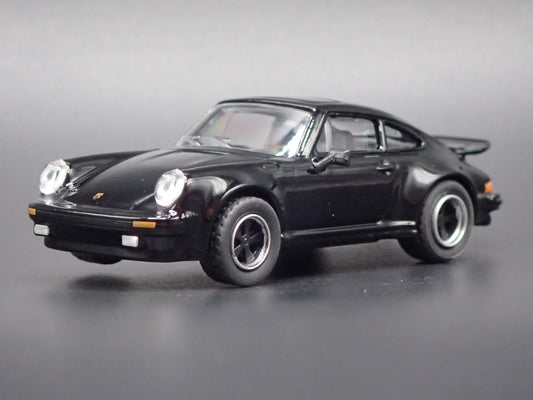 1975 - 1989 PORSCHE 930 TURBO BLACK 1:64 SCALE COLLECTIBLE DIORAMA DIECAST MODEL CAR