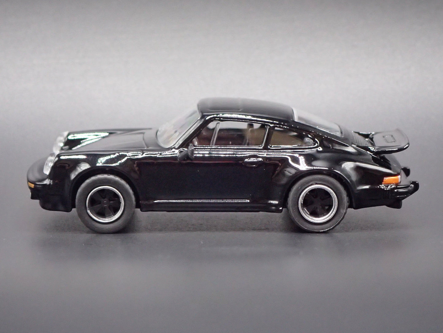 1975 - 1989 PORSCHE 930 TURBO BLACK 1:64 SCALE COLLECTIBLE DIORAMA DIECAST MODEL CAR