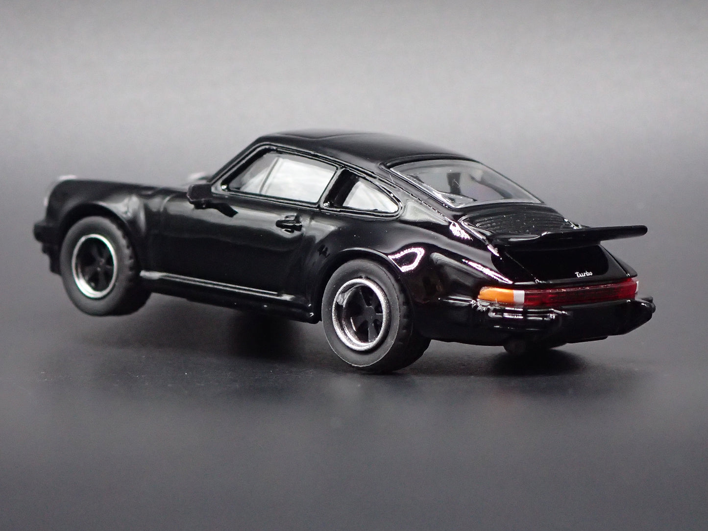 1975 - 1989 PORSCHE 930 TURBO BLACK 1:64 SCALE COLLECTIBLE DIORAMA DIECAST MODEL CAR