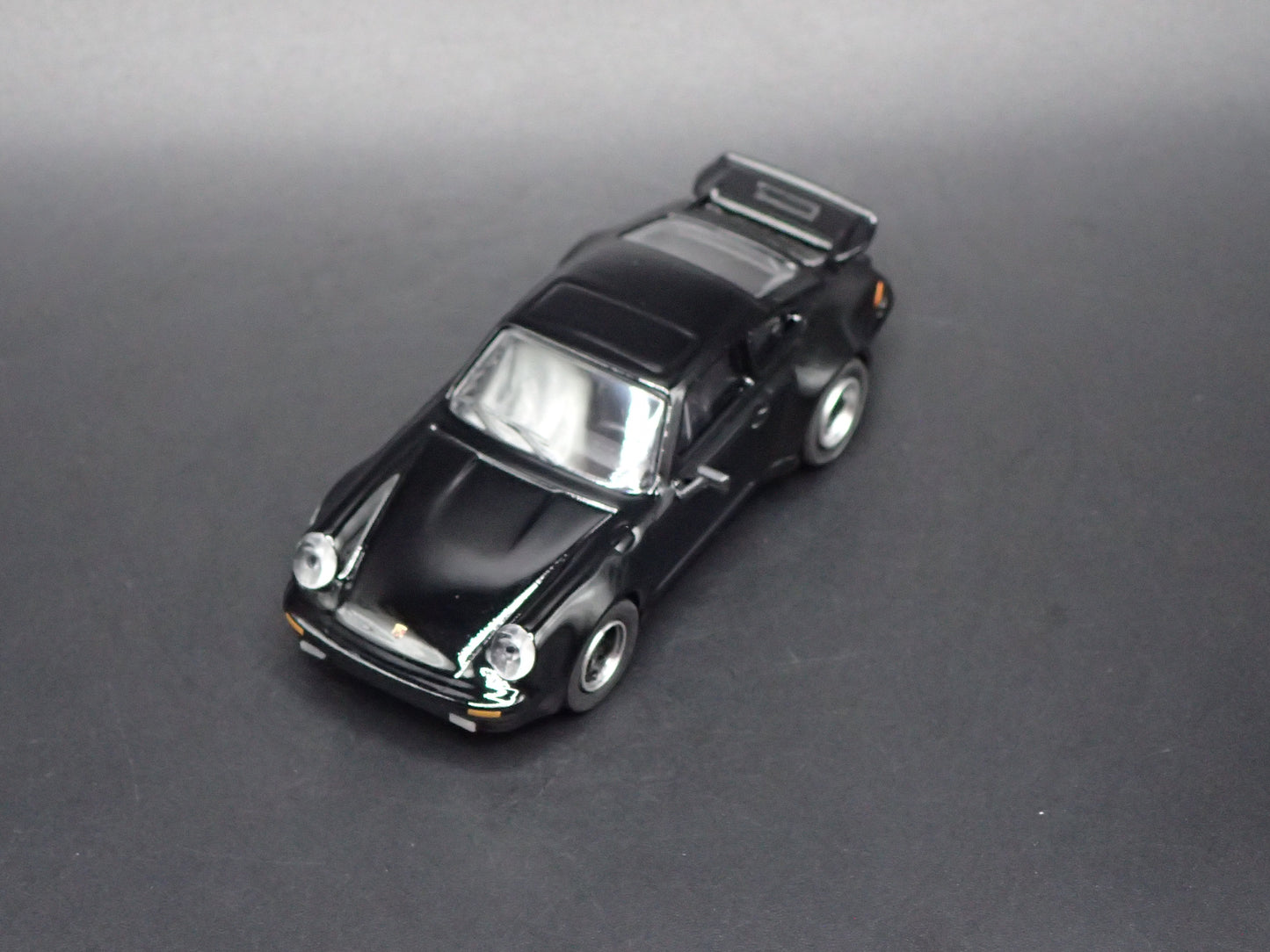 1975 - 1989 PORSCHE 930 TURBO BLACK 1:64 SCALE COLLECTIBLE DIORAMA DIECAST MODEL CAR