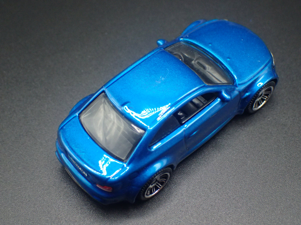 2007-2013 BMW 1M COUPE E82 1:64 SCALE COLLECTIBLE DIORAMA DIECAST MODEL CAR