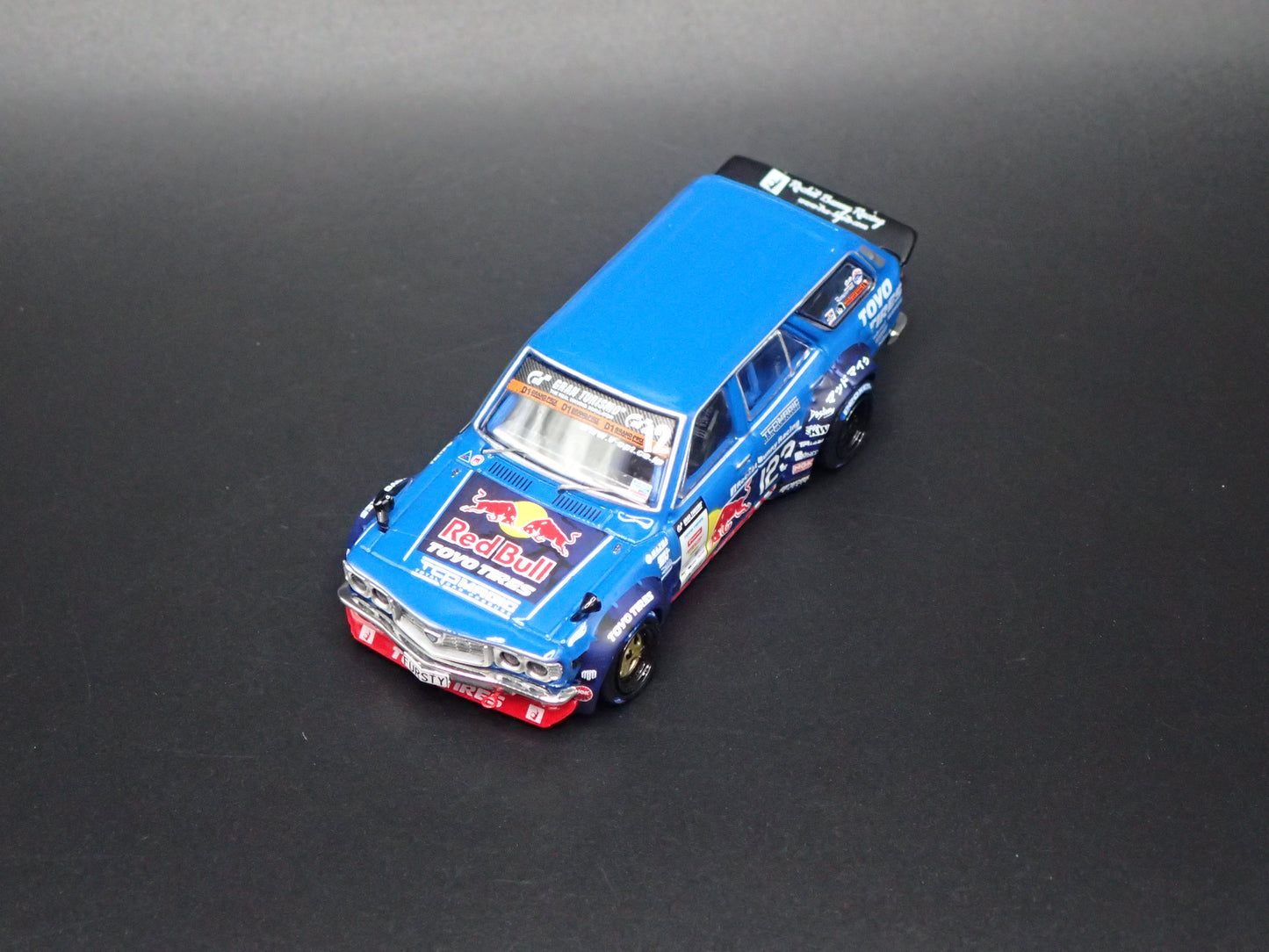 1971-1978 MAZDA RX3 STATION AGON RED BULL MAD MIKE 1:64 SCALE DIORAMA DIECAST MODEL CAR