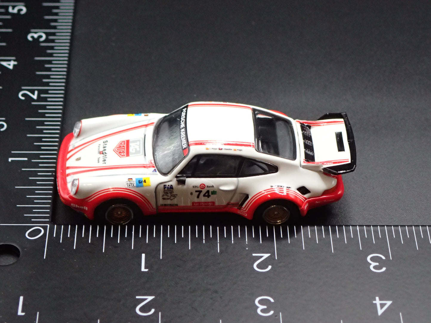 PORSCHE 911 CARRERA RSR 3.0 AURORA RACING 1:64 SCALE DIECAST MODEL CAR