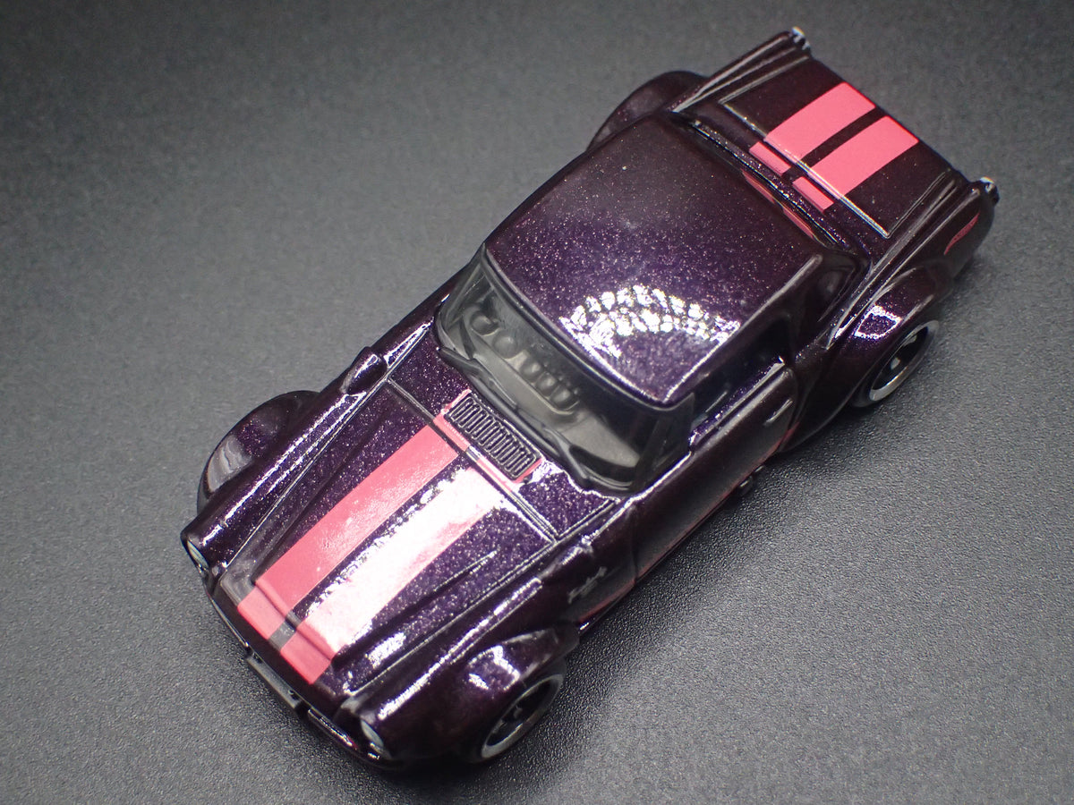 1967-1970 DATSUN FAIRLADY 2000 BLACK 1:64 SCALE DIORAMA DIECAST MODEL CAR