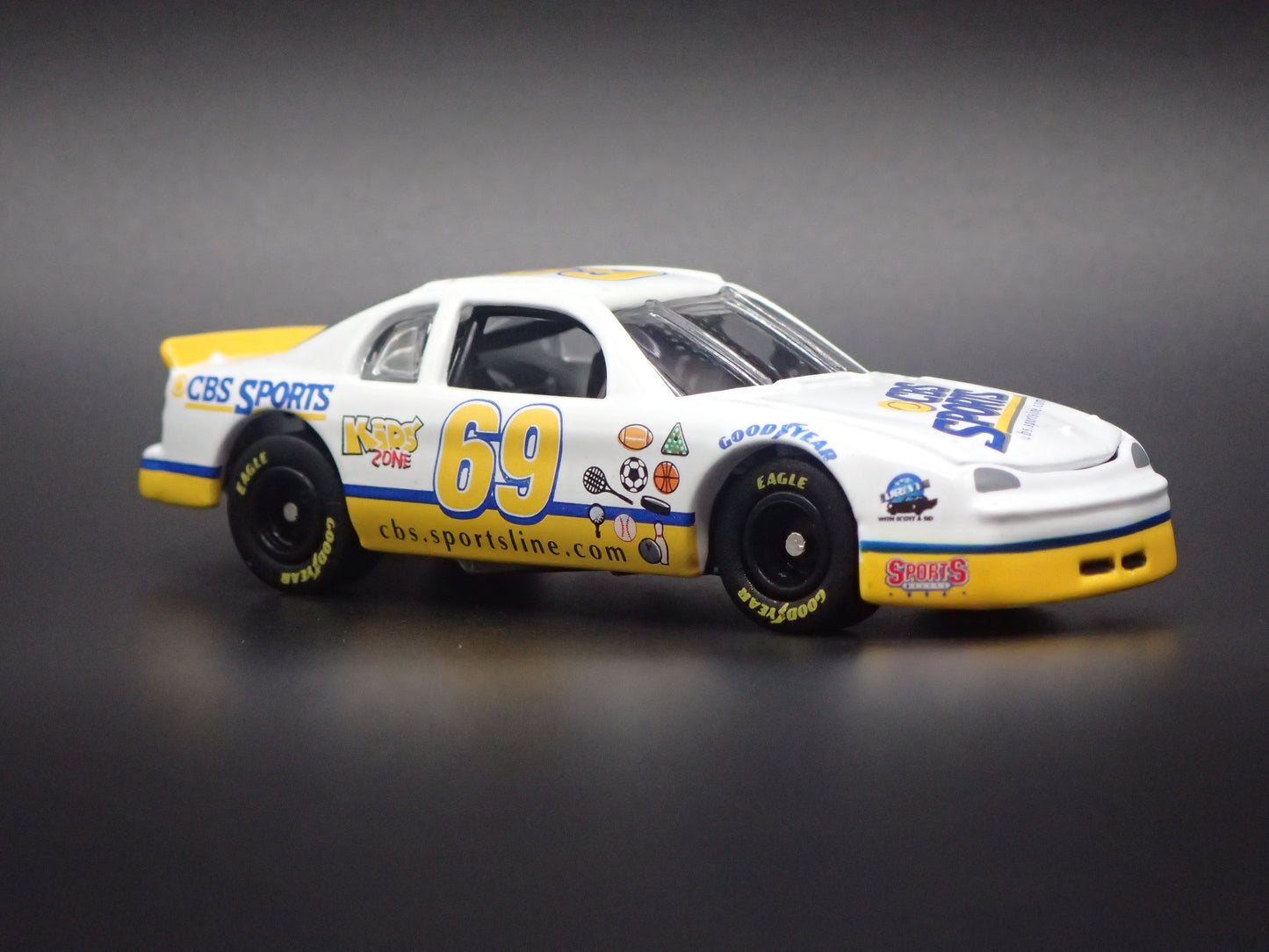 1998 98 CHEVROLET MONTE CARLO 69 CBS SPORTS NASCAR 1:64 SCALE DIECAST MODEL CAR