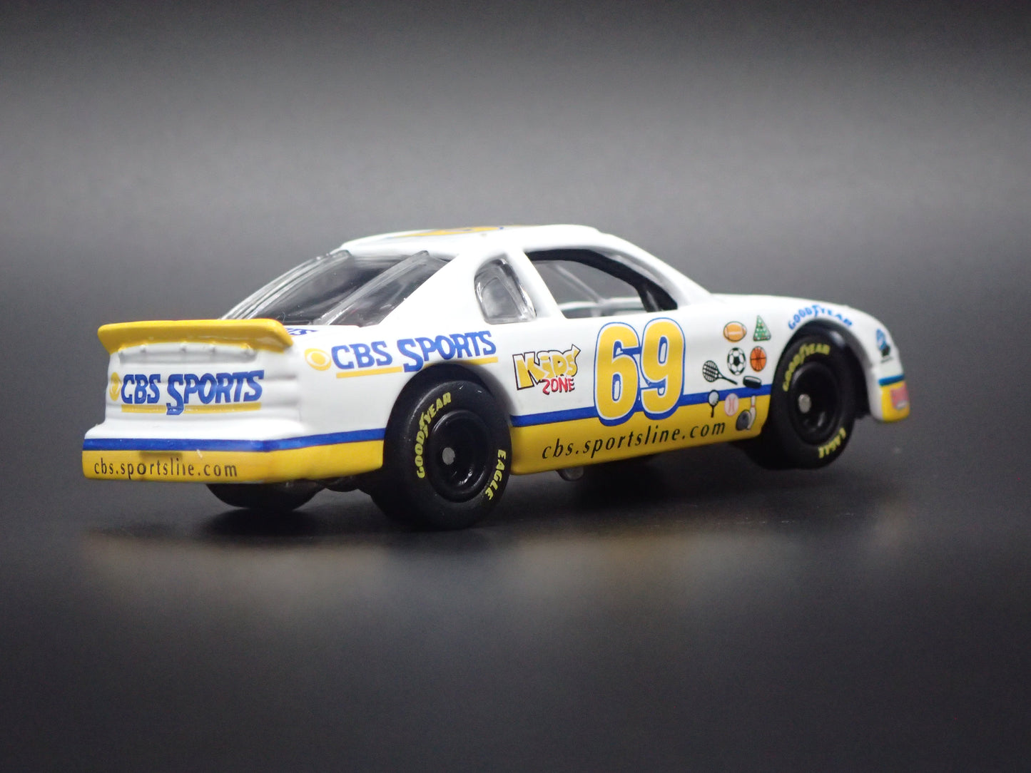 1998 98 CHEVROLET MONTE CARLO 69 CBS SPORTS NASCAR 1:64 SCALE DIECAST MODEL CAR