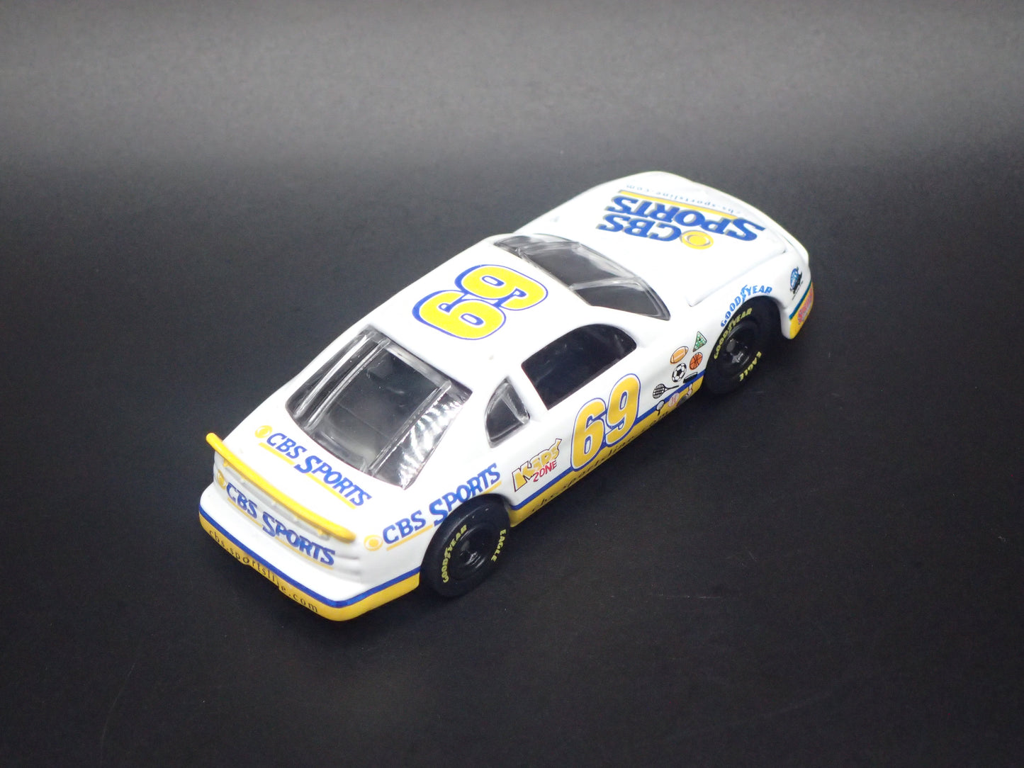1998 98 CHEVROLET MONTE CARLO 69 CBS SPORTS NASCAR 1:64 SCALE DIECAST MODEL CAR