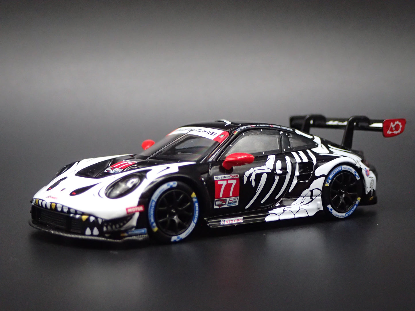 PORSCHE 911 GT3 R #77 REXY SKELETON 2025 IMSA 1:64 SCALE DIECAST MODEL CAR