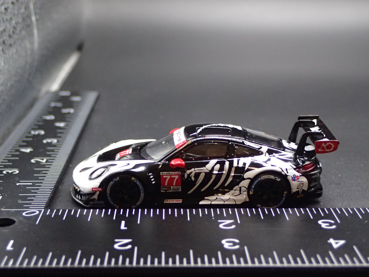 PORSCHE 911 GT3 R #77 REXY SKELETON 2025 IMSA 1:64 SCALE DIECAST MODEL CAR