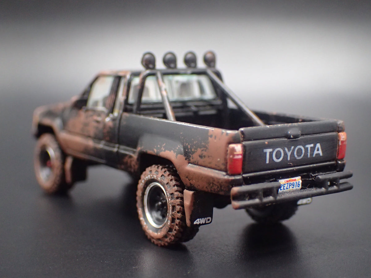 1984-1988 TOYOTA SR5 PICKUP TRUCK MUDDY 1/64 SCALE COLLECTIBLE DIECAST MODEL CAR