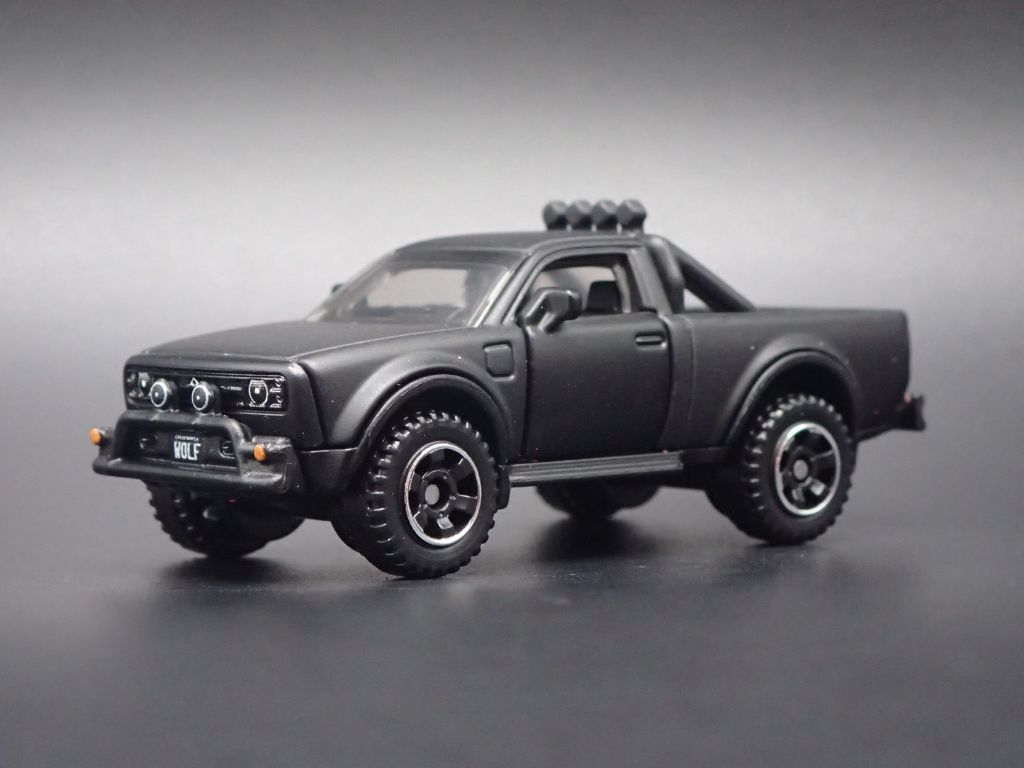 ALPHA WOLF EV ELECTRIC TRUCK BLACK 1:64 SCALE COLLECTIBLE DIECAST MODEL CAR