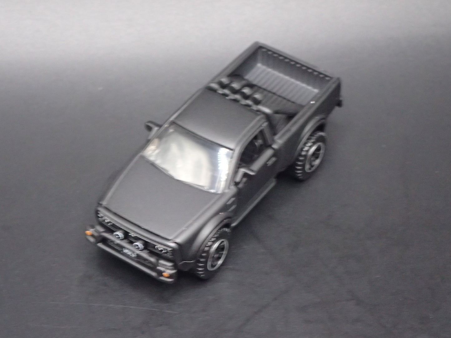 ALPHA WOLF EV ELECTRIC TRUCK BLACK 1:64 SCALE COLLECTIBLE DIECAST MODEL CAR