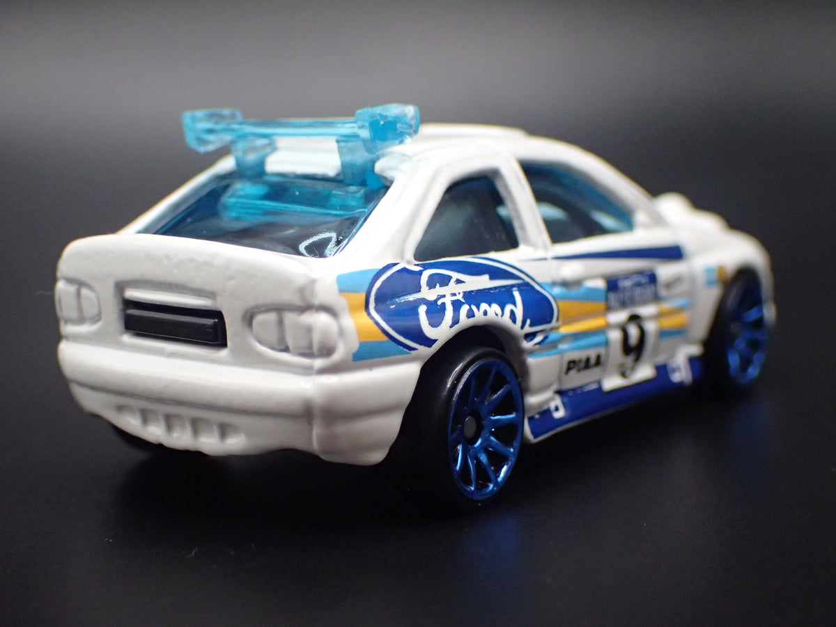 FORD ESCORT RALLY RACING WHITE 1:64 SCALE COLLECTIBLE DIECAST MODEL CAR
