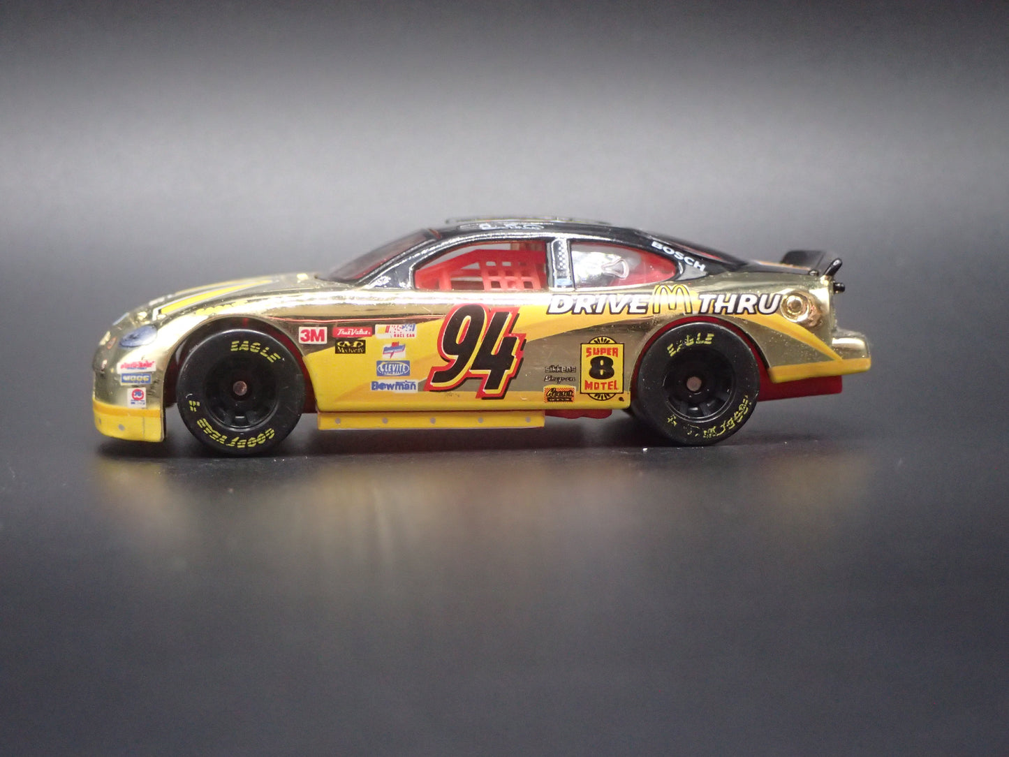1999 99 FORD TAURUS 94 BILL ELLIOTT GOLD NASCAR 1/64 SCALE DIECAST MODEL CAR