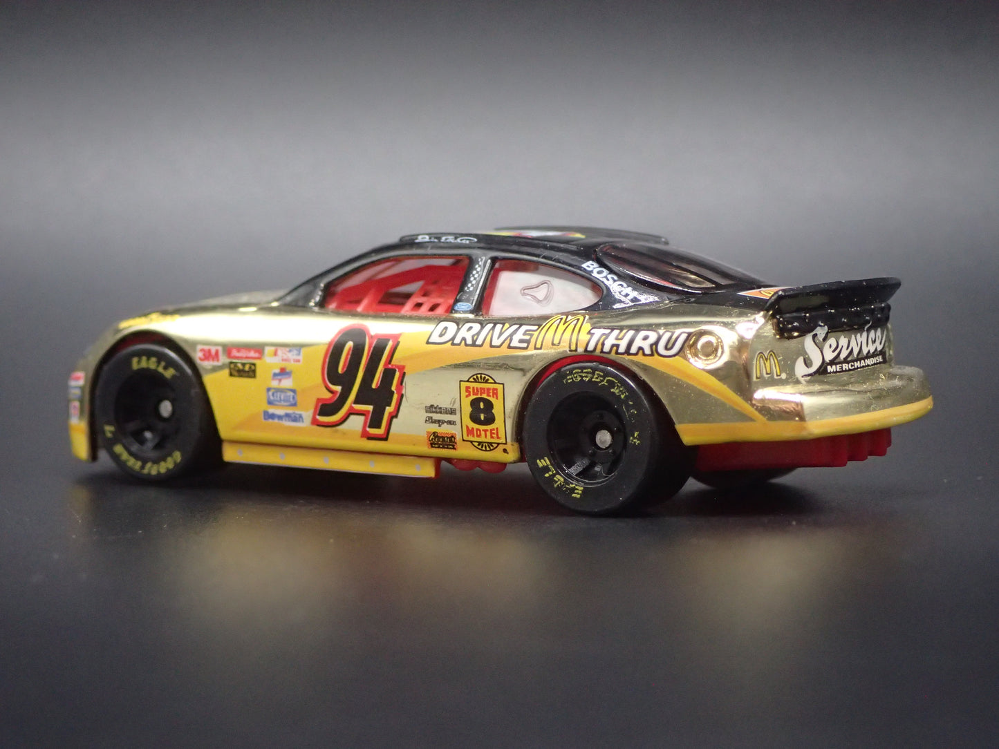 1999 99 FORD TAURUS 94 BILL ELLIOTT GOLD NASCAR 1/64 SCALE DIECAST MODEL CAR