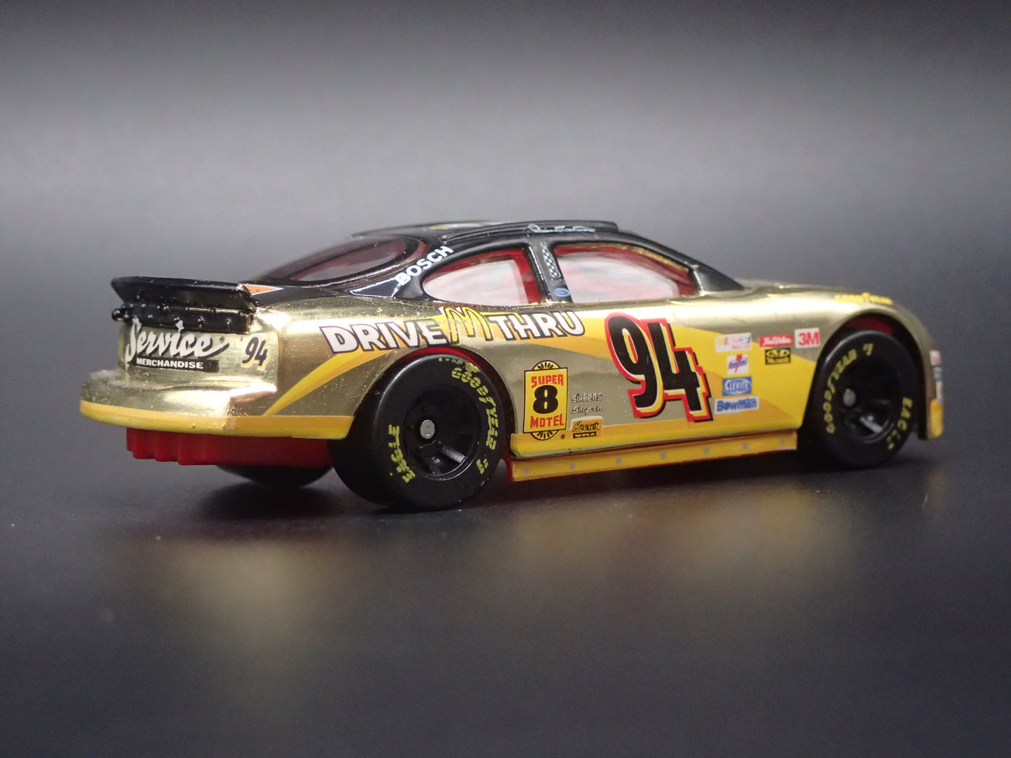 1999 99 FORD TAURUS 94 BILL ELLIOTT GOLD NASCAR 1/64 SCALE DIECAST MODEL CAR