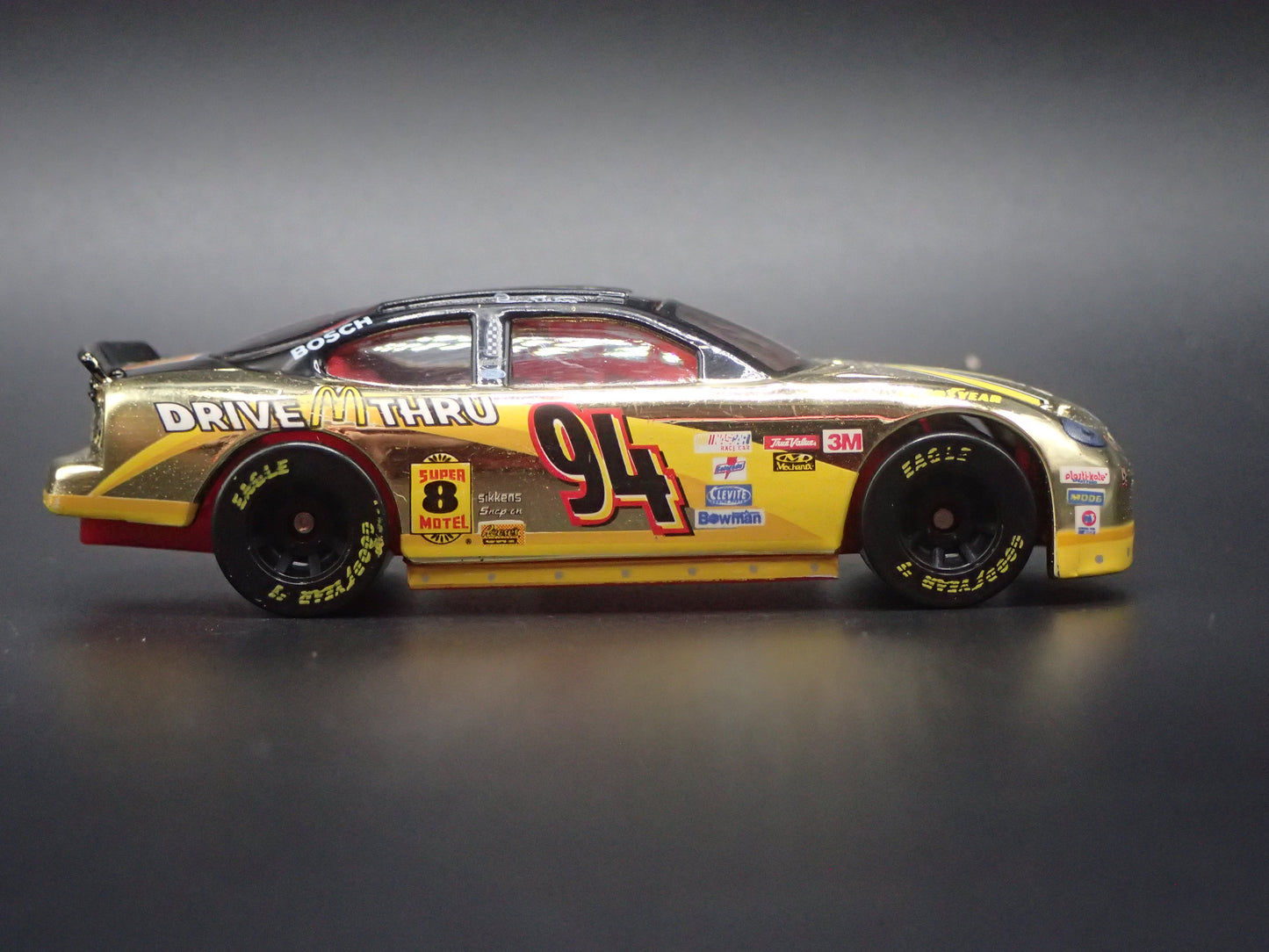 1999 99 FORD TAURUS 94 BILL ELLIOTT GOLD NASCAR 1/64 SCALE DIECAST MODEL CAR