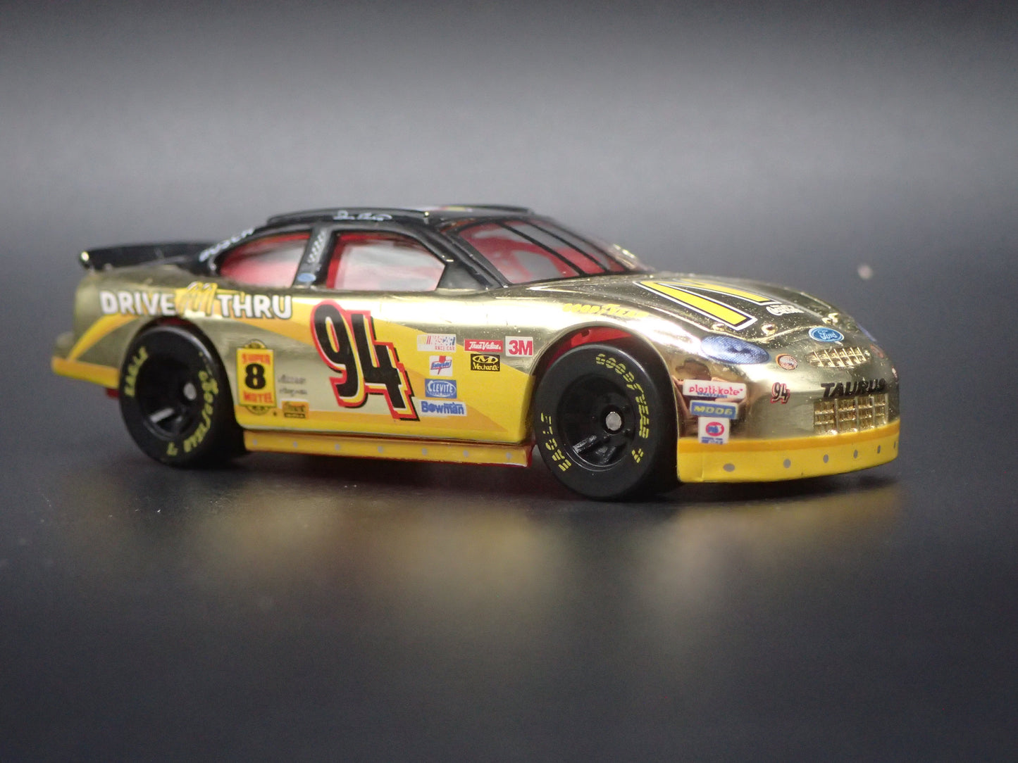 1999 99 FORD TAURUS 94 BILL ELLIOTT GOLD NASCAR 1/64 SCALE DIECAST MODEL CAR