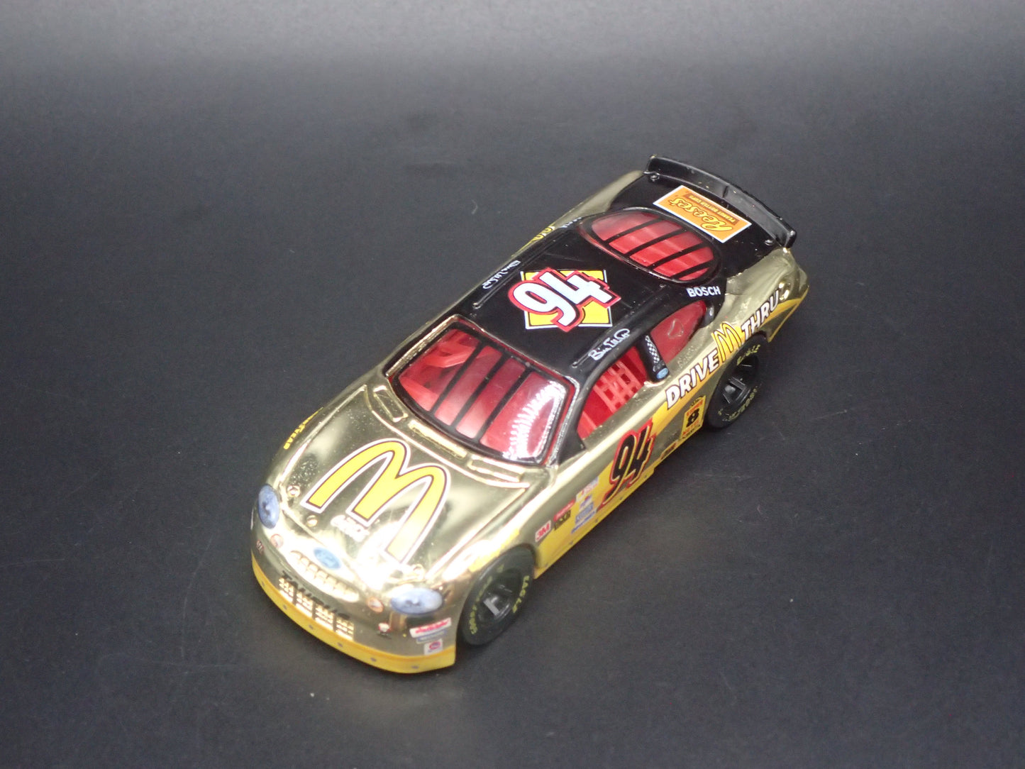 1999 99 FORD TAURUS 94 BILL ELLIOTT GOLD NASCAR 1/64 SCALE DIECAST MODEL CAR