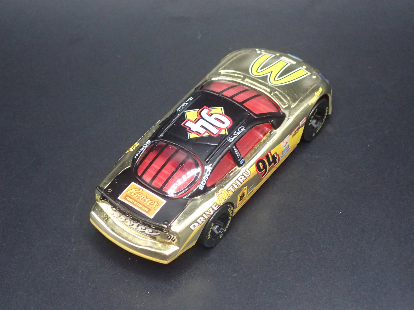 1999 99 FORD TAURUS 94 BILL ELLIOTT GOLD NASCAR 1/64 SCALE DIECAST MODEL CAR