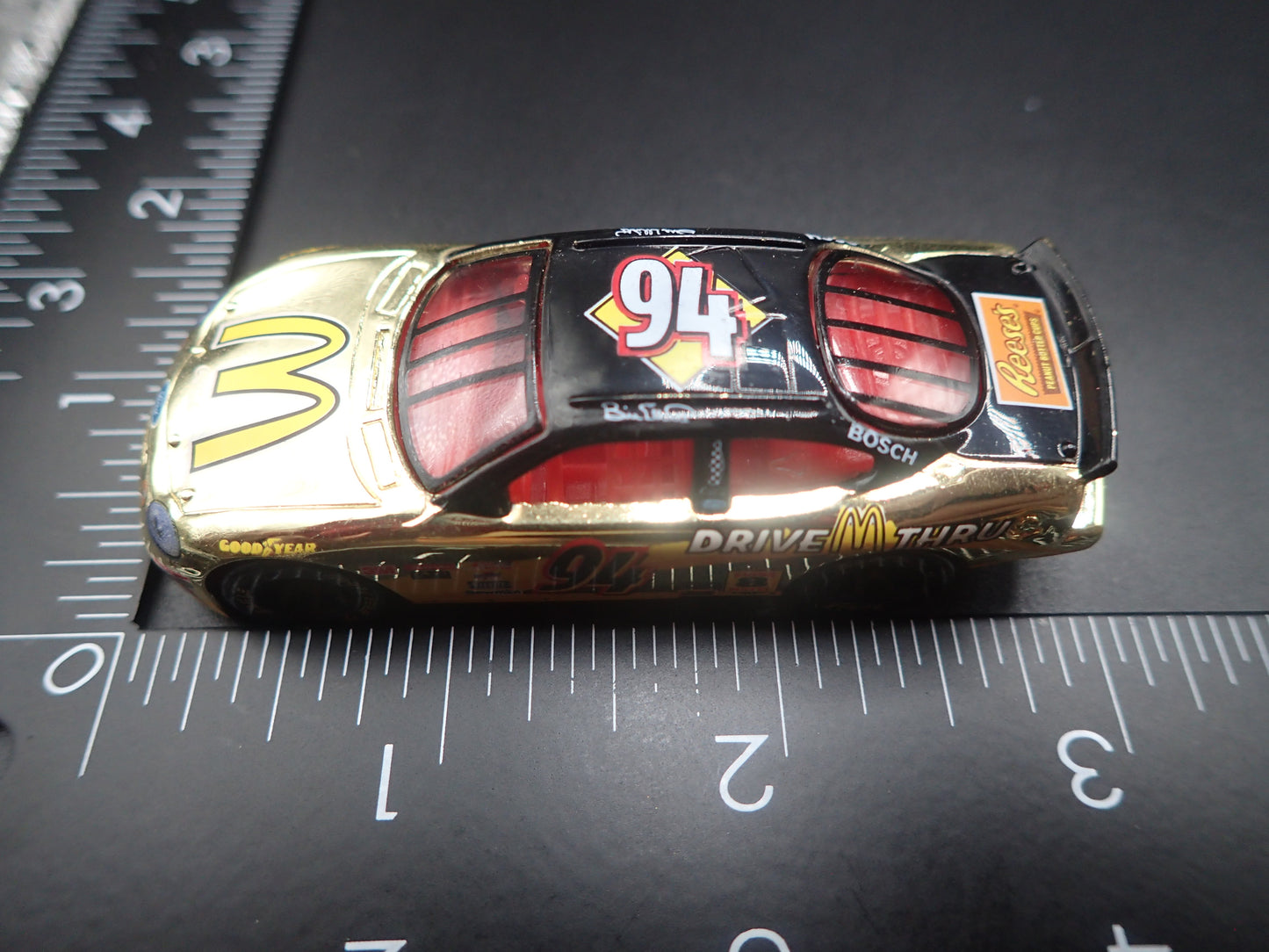 1999 99 FORD TAURUS 94 BILL ELLIOTT GOLD NASCAR 1/64 SCALE DIECAST MODEL CAR