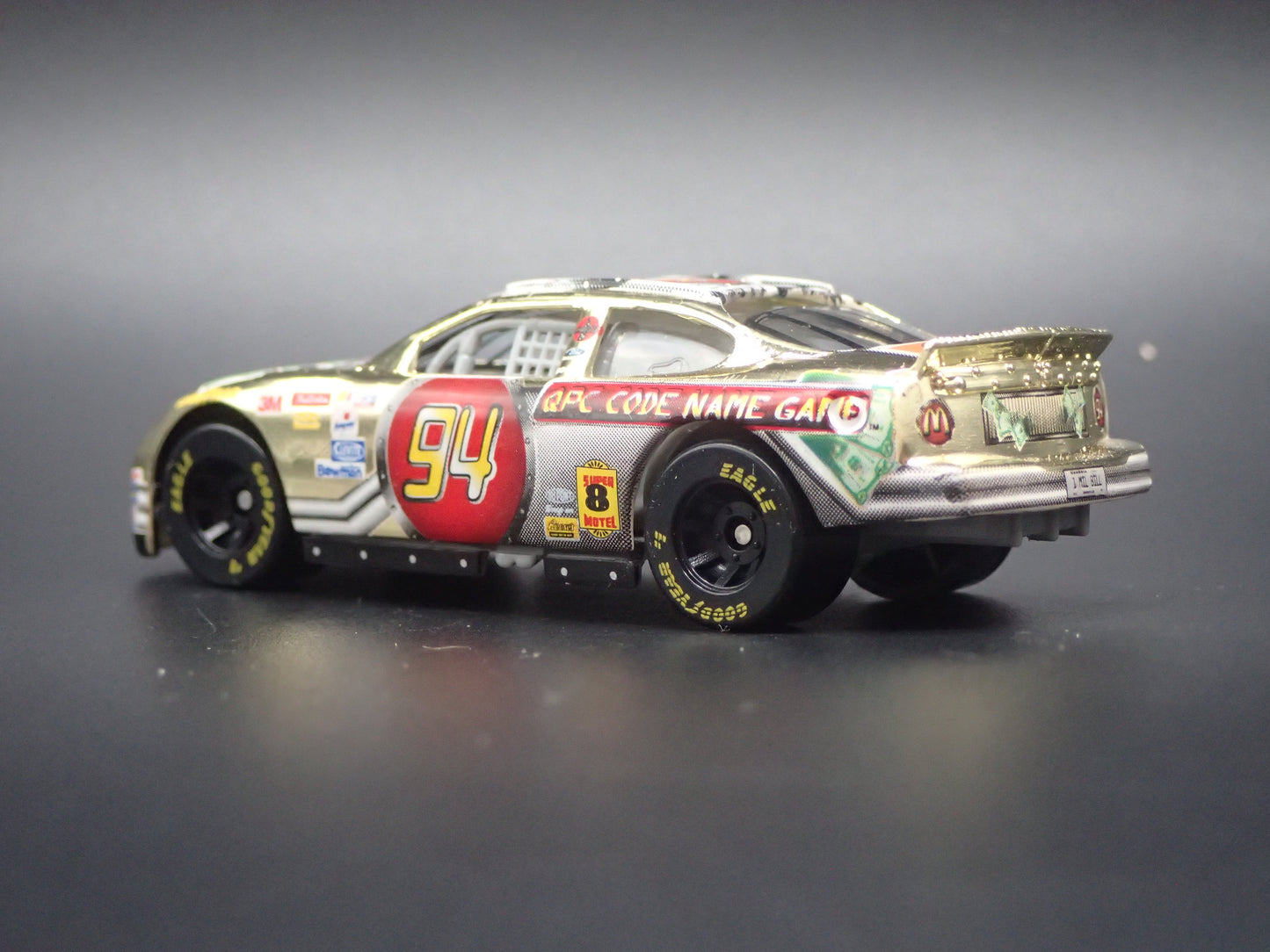 1999 99 FORD TAURUS 94 BILL ELLIOTT GOLD NASCAR 1/64 SCALE DIECAST MODEL CAR