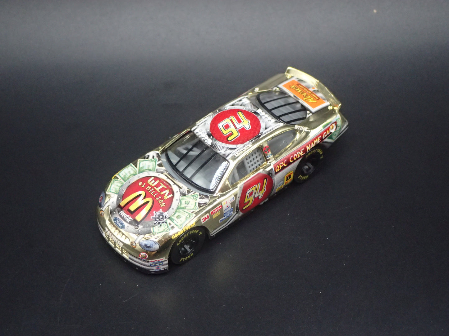 1999 99 FORD TAURUS 94 BILL ELLIOTT GOLD NASCAR 1/64 SCALE DIECAST MODEL CAR