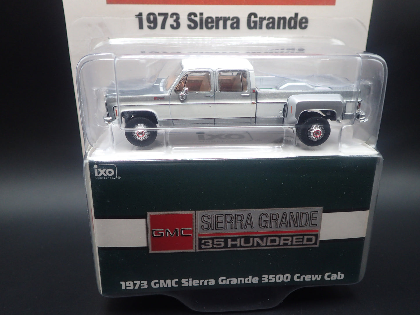2026 IXO 1973 GMC SIERRA GRANDE 3500 CREW CAB RAW CHASE 1:64 DIECAST MODEL CAR