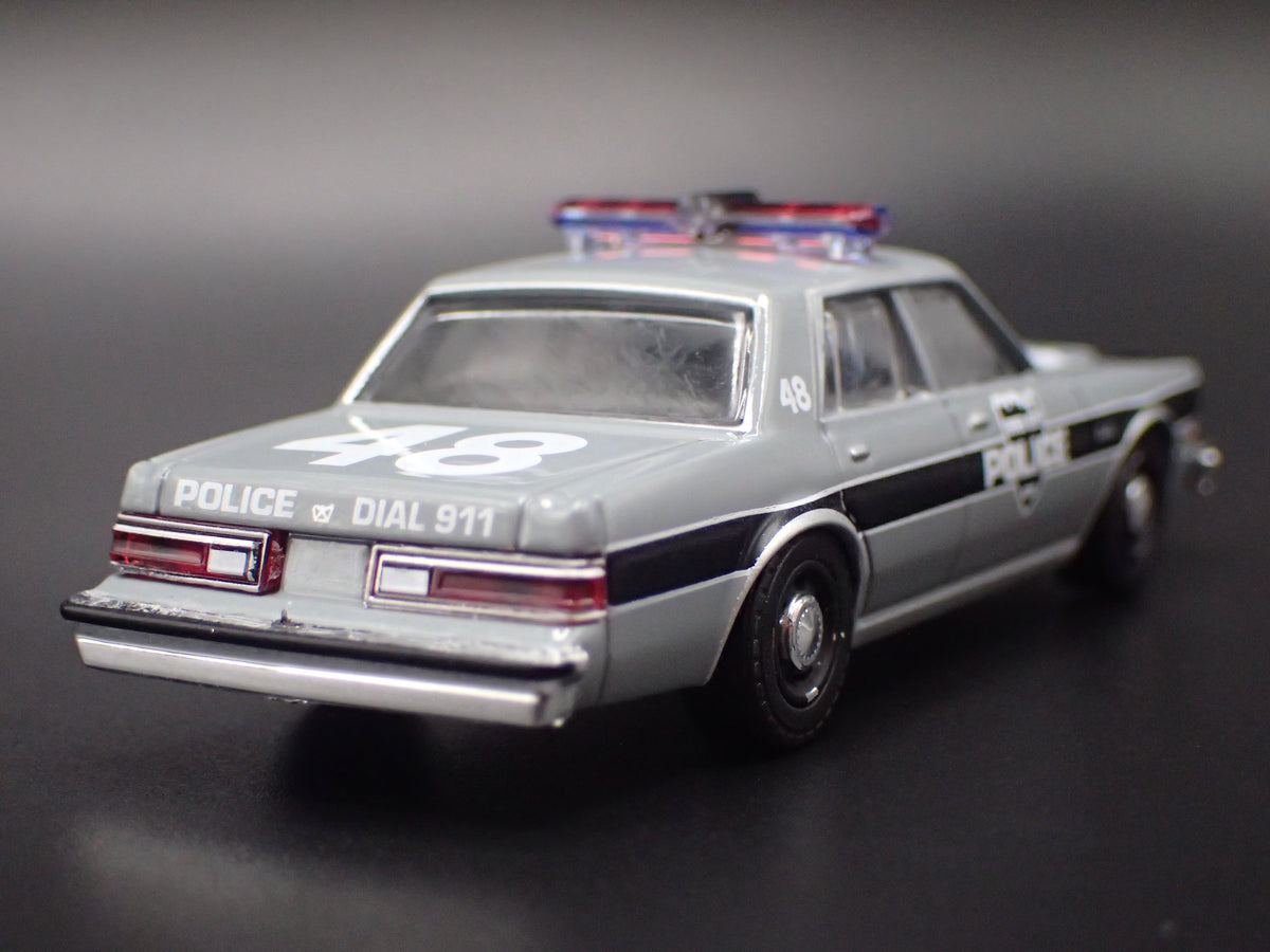 1984 84 PLYMOUTH GRAND FURY DETROIT MICHIGAN POLICE 1:64 SCALE DIECAST MODEL CAR