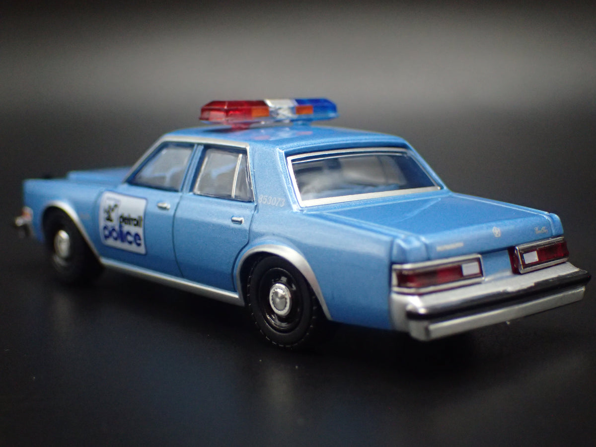 1982 82 PLYMOUTH GRAN FURY DETROIT MICHIGAN POLICE 1:64 SCALE DIECAST MODEL CAR