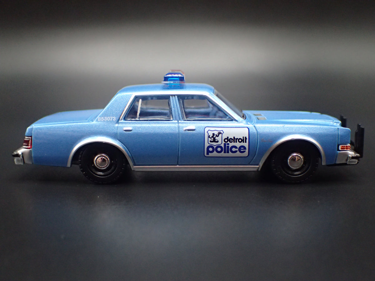 1982 82 PLYMOUTH GRAN FURY DETROIT MICHIGAN POLICE 1:64 SCALE DIECAST MODEL CAR