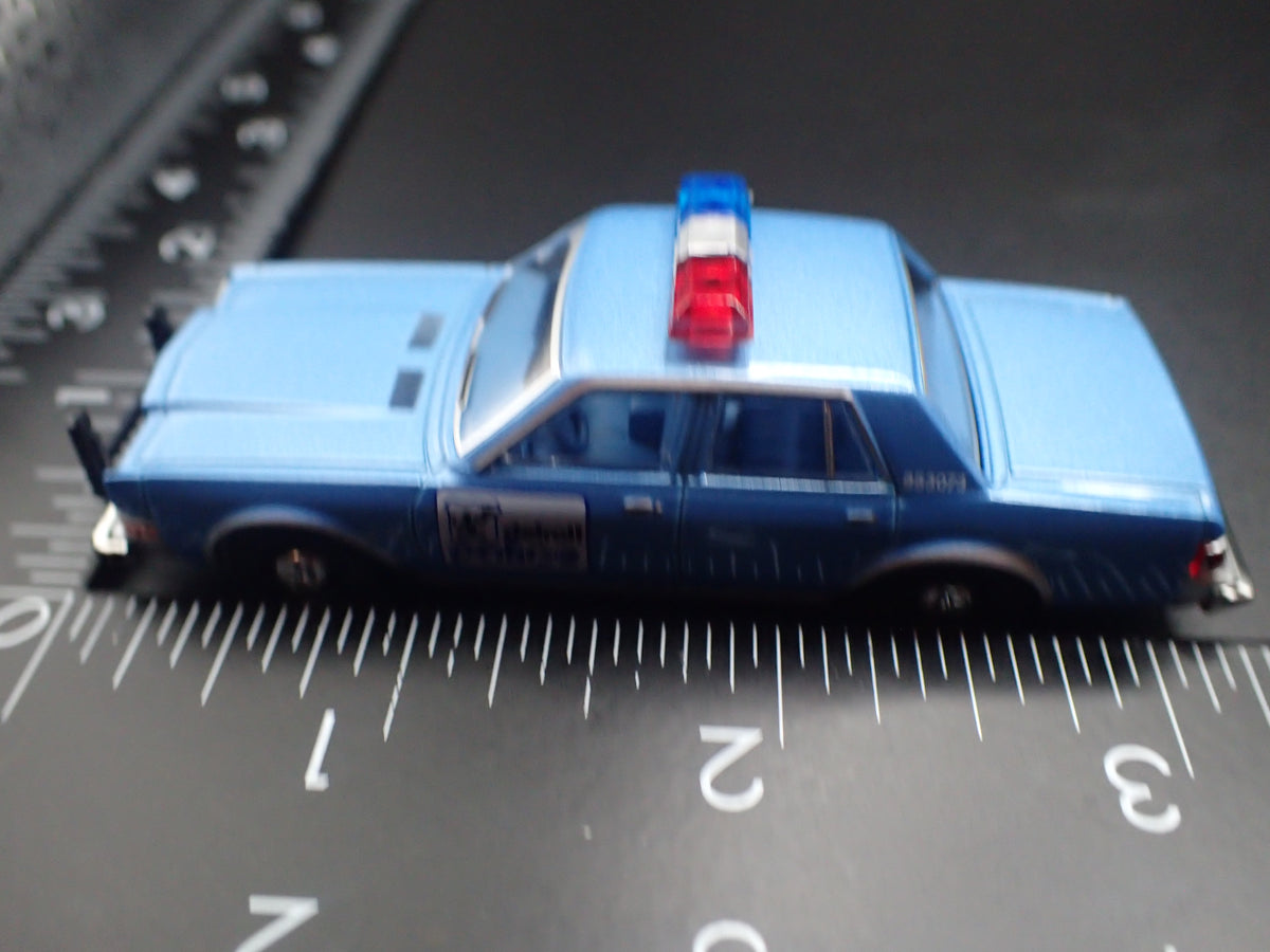 1982 82 PLYMOUTH GRAN FURY DETROIT MICHIGAN POLICE 1:64 SCALE DIECAST MODEL CAR