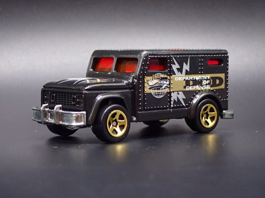 DEPARTMENT OF DEFENSE INTERNATIONAL ARMORED TRUCK 1:64 HW SCALE DIECAST MODEL CAR