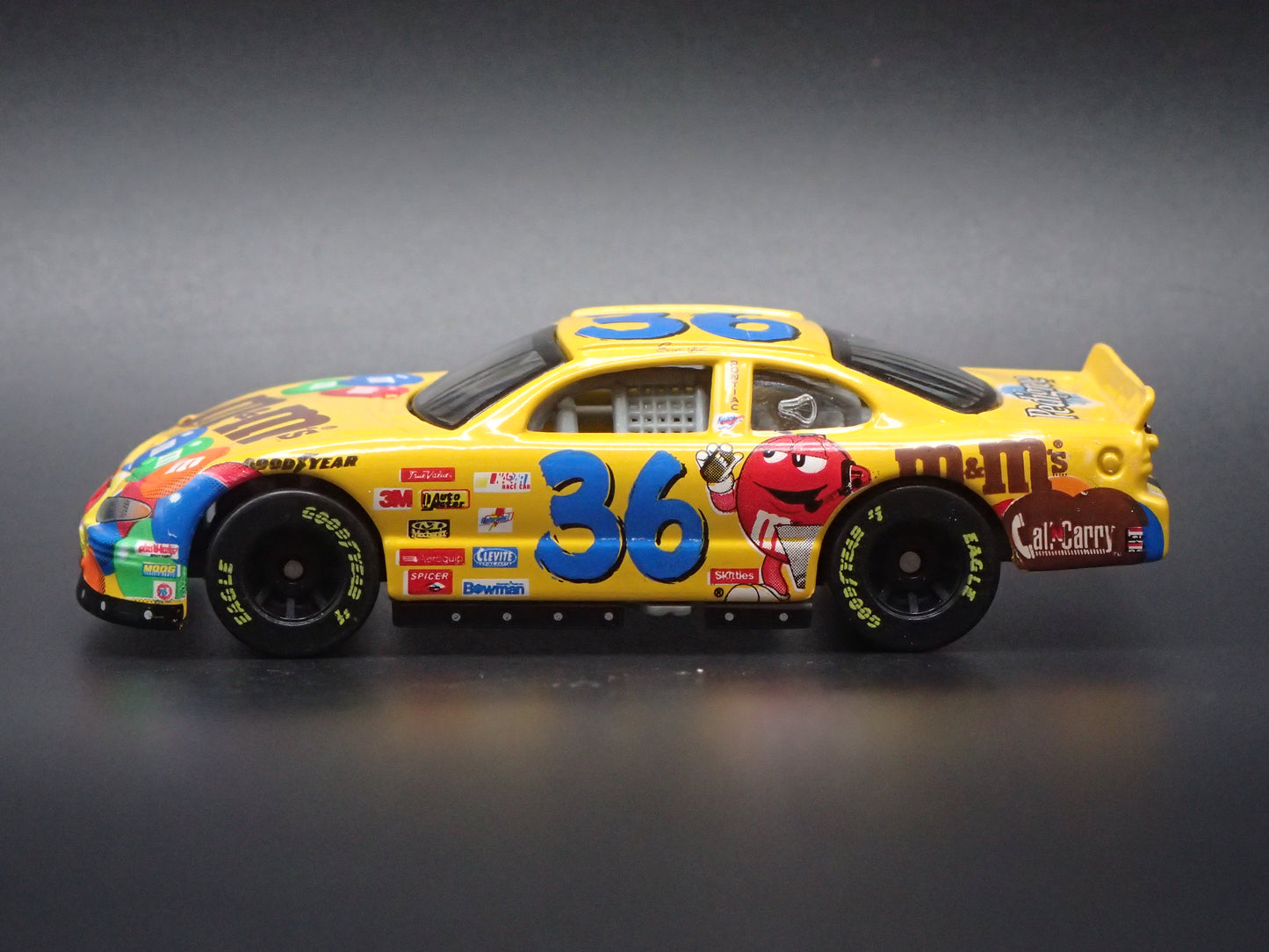 1999 99 PONTIAC GRAND PRIX 36 ERNIE ERVIN M&M NASCAR 1:64 DIECAST MODEL CAR