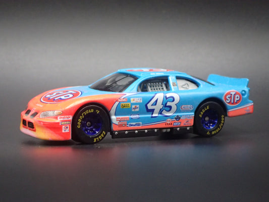 1999 99 PONTIAC GRAND PRIX JOHN ANDRETTI STP NASCAR 1:64 DIECAST MODEL CAR
