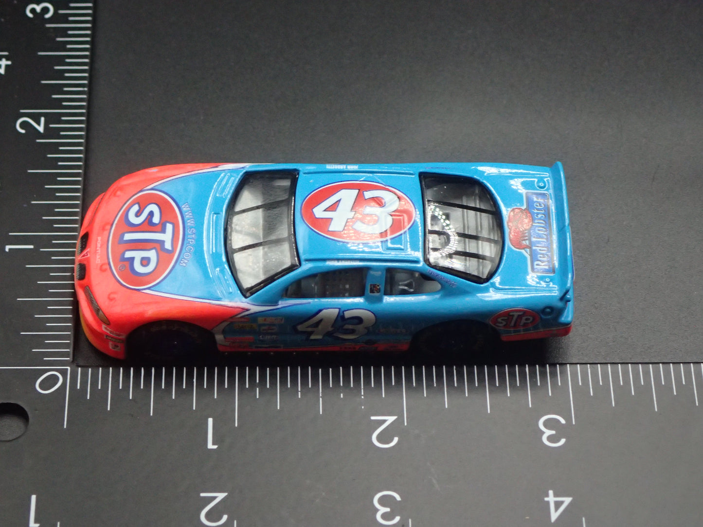 1999 99 PONTIAC GRAND PRIX JOHN ANDRETTI STP NASCAR 1:64 DIECAST MODEL CAR