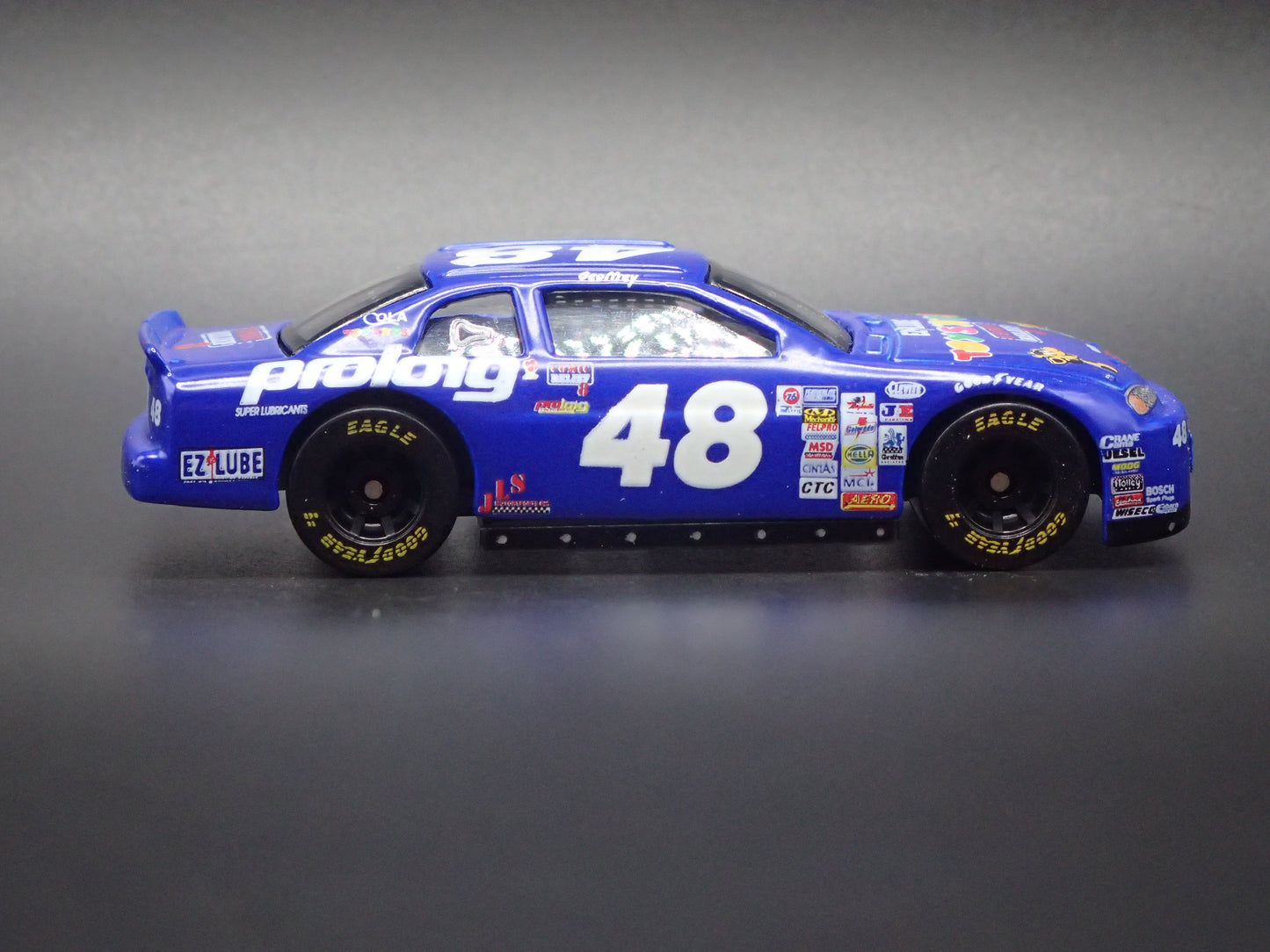 1999 CHEVY CHEVROLET MONTE CARLO 48 TOYS R US NASCAR 1:64 SCALE DIECAST MODEL CAR