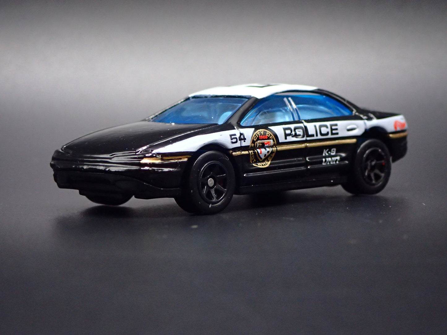 1995-1999 OLDS OLDSMOBILE AURORA POLICE 1:64 COLLECTIBLE DIORAMA DIECAST MODEL CAR