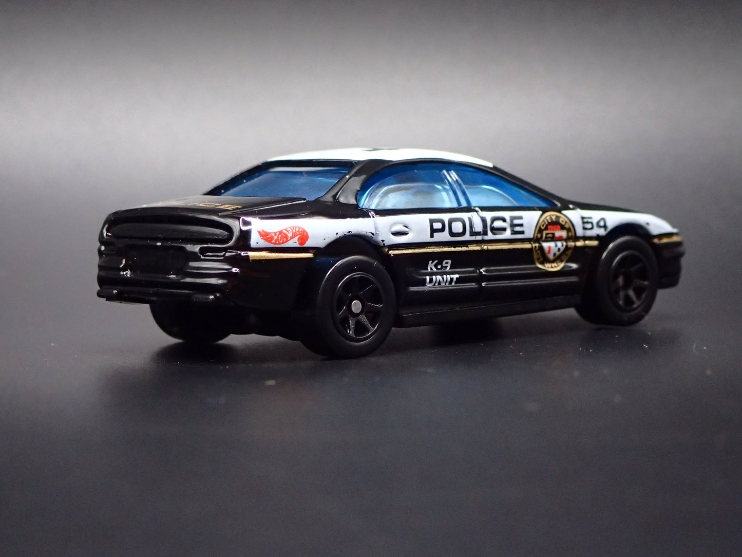 1995-1999 OLDS OLDSMOBILE AURORA POLICE 1:64 COLLECTIBLE DIORAMA DIECAST MODEL CAR