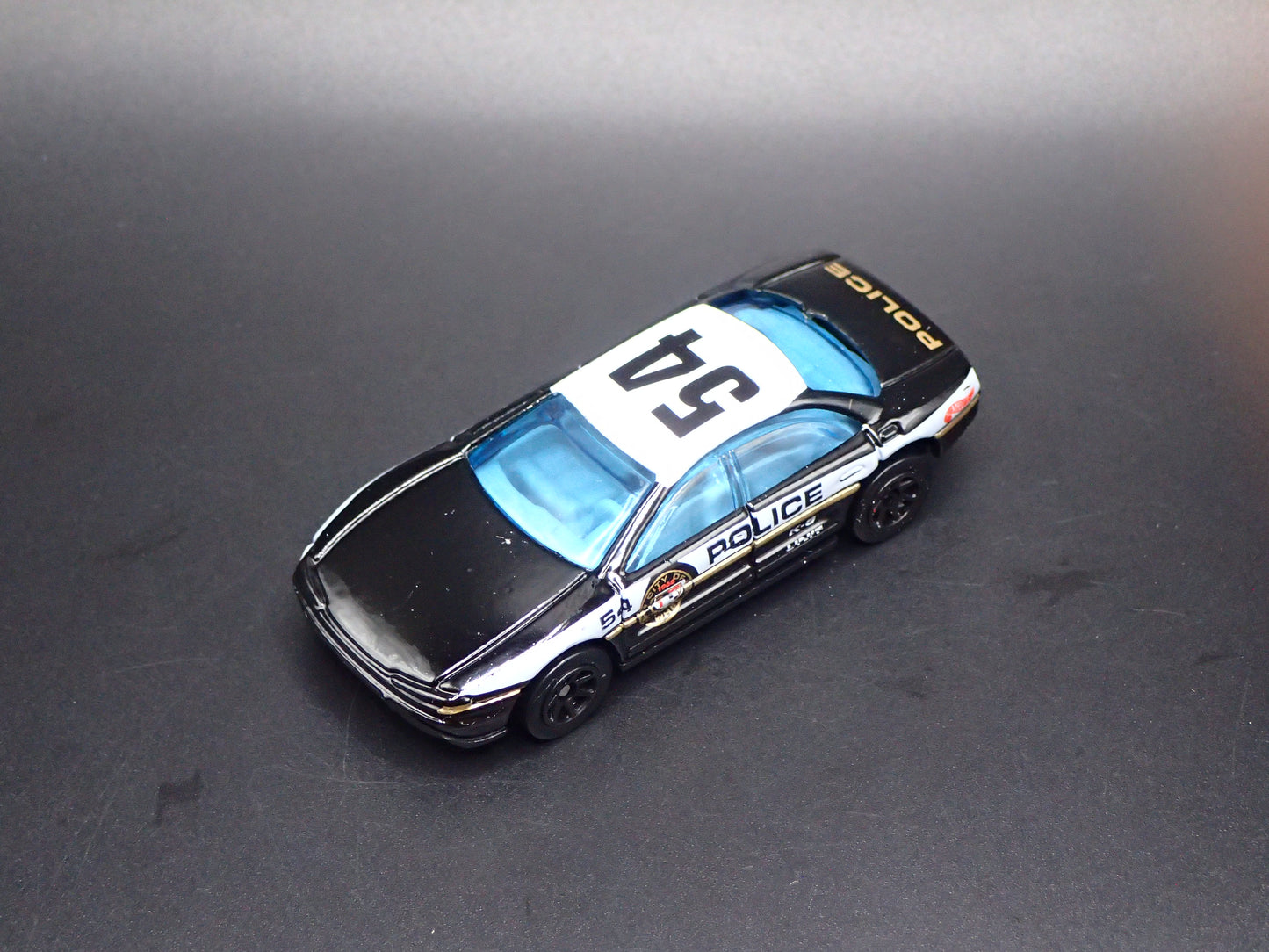 1995-1999 OLDS OLDSMOBILE AURORA POLICE 1:64 COLLECTIBLE DIORAMA DIECAST MODEL CAR