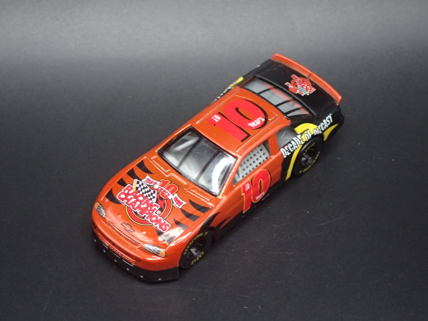 1999 CHEVY CHEVROLET MONTE CARLO 10TH ANV CHROME NASCAR 1:64 SCALE DIECAST CAR