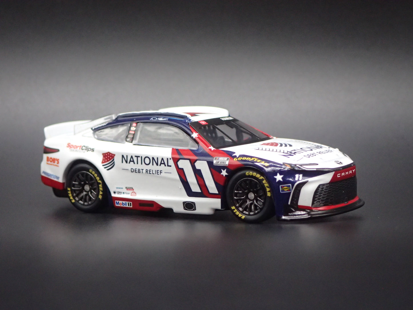 2026 26 TOYOTA CAMRY 11 DENNY HAMLIN DEBT RELIEF NASCAR 1:64 SCALE DIECAST CAR