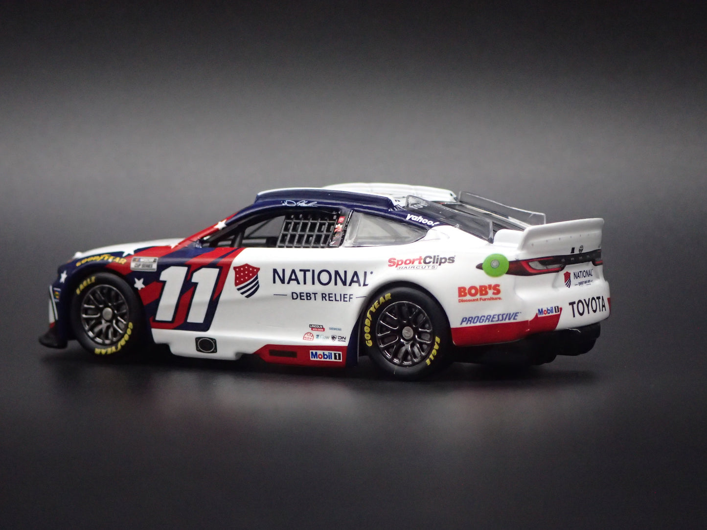 2026 26 TOYOTA CAMRY 11 DENNY HAMLIN DEBT RELIEF NASCAR 1:64 SCALE DIECAST CAR