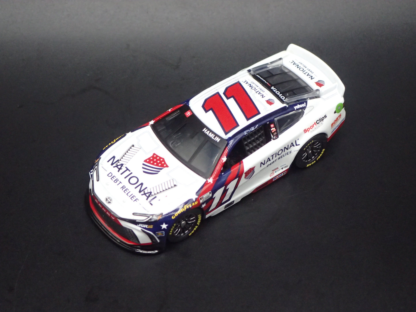 2026 26 TOYOTA CAMRY 11 DENNY HAMLIN DEBT RELIEF NASCAR 1:64 SCALE DIECAST CAR